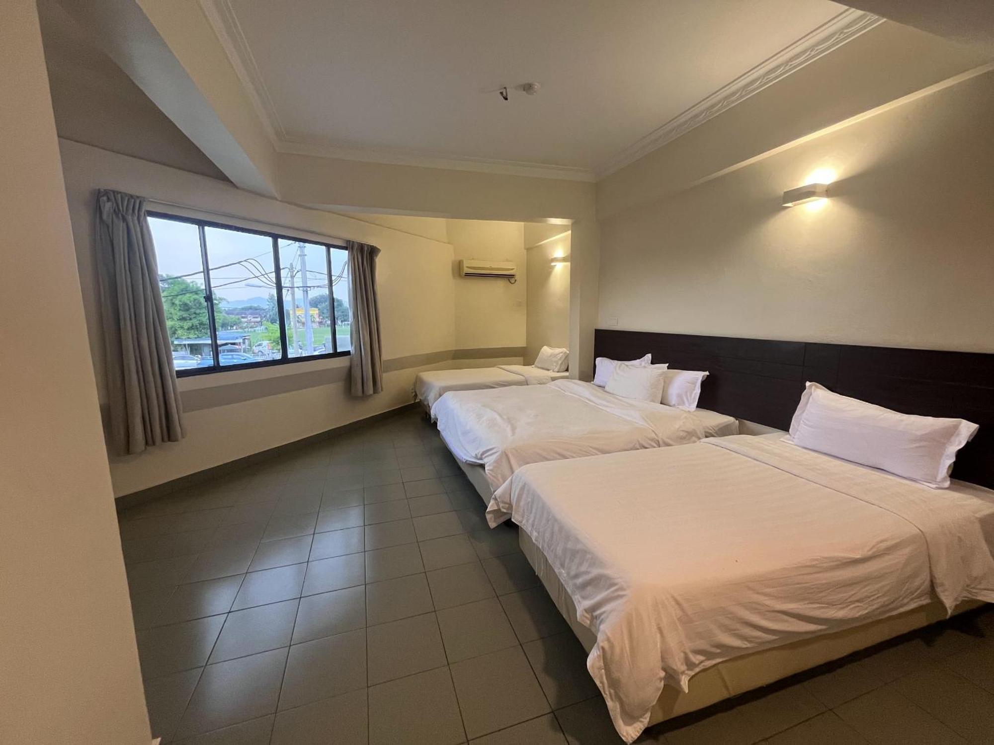 Hotel Sitiawan Buitenkant foto